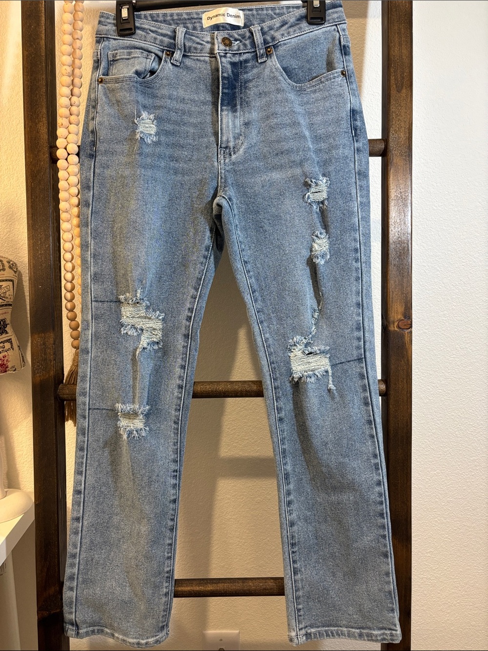 Dynamic Denim Light Blue Straight Leg Jeans with Distressed Detail
